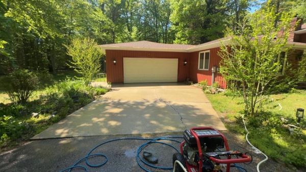 Freshly pressure washed concrete driveway in Grand Haven, Michigan